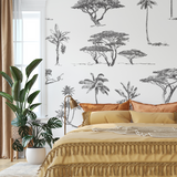 "Wall Blush's Acacia Wallpaper showcased in a stylish bedroom setting with botanical pattern focus."