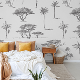 "Wall Blush's Acacia Wallpaper in a modern bedroom setting, highlighting the detailed tree designs as the focal point."
