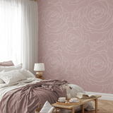 "Wall Blush Adelyn Wallpaper showcasing its elegant rose pattern in a cozy bedroom setting, enhancing the room's aesthetic."