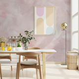 "Wall Blush Aesthetic Wallpaper in modern dining room with pink brushstroke design and stylish decor."