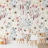 Alt: "Alice Wallpaper by Wall Blush featuring a floral design in a children's playroom, emphasizing a fresh, playful ambiance."