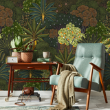 "Baloo Wallpaper by Wall Blush showcasing a botanical design in a cozy reading room setup."