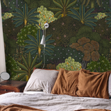 "Baloo Wallpaper from Wall Blush showcasing in a cozy bedroom, emphasizing the vibrant tropical pattern."