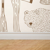 "Wall Blush's Trail Blazer (Cream) Wallpaper in a modern room, highlighting elegant wall decor focus."