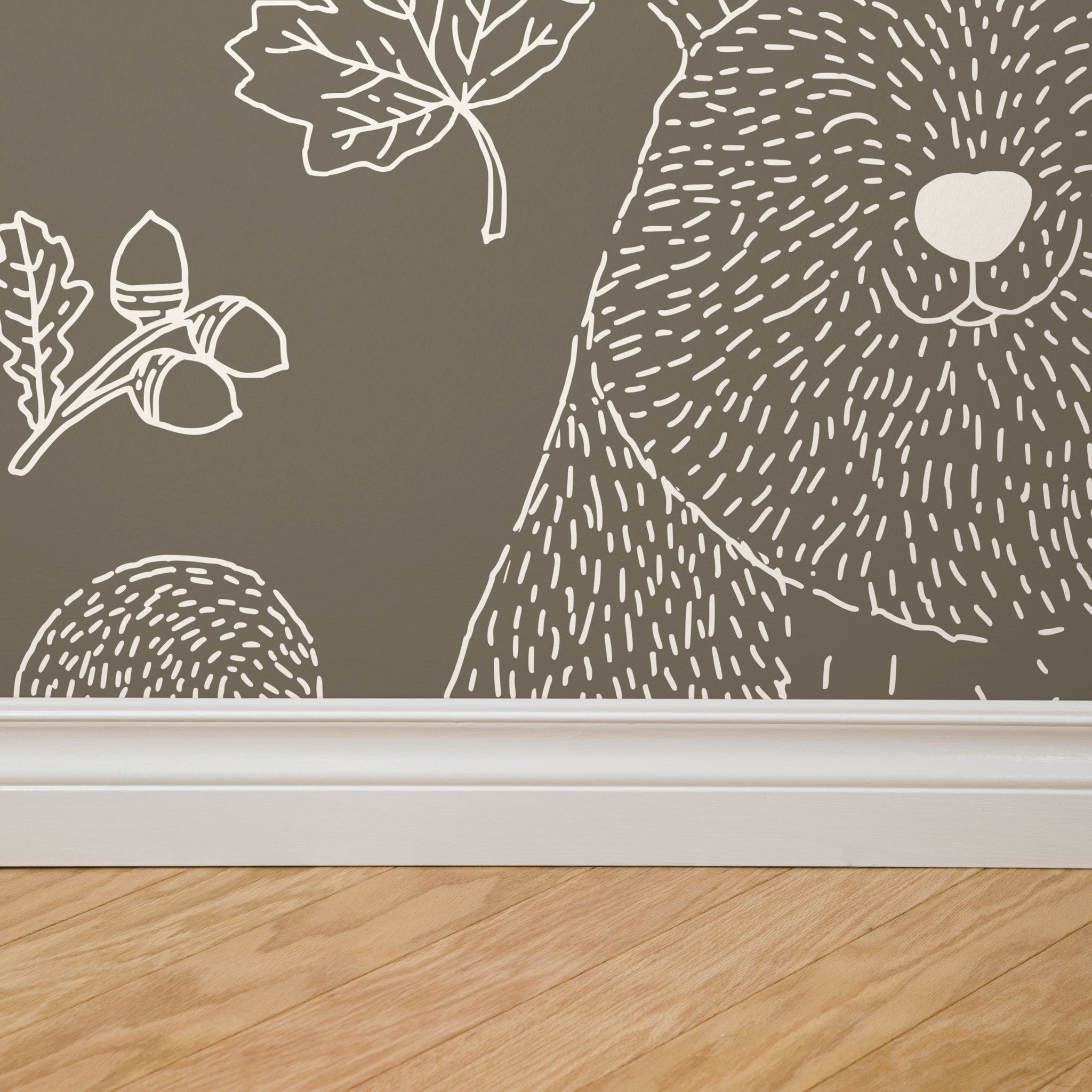 "Wall Blush Woodland (Dark) Wallpaper featured in a modern living room, bringing nature-inspired decor to the walls."