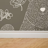 "Wall Blush Woodland (Dark) Wallpaper featured in a modern living room, bringing nature-inspired decor to the walls."