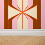 "Felicity Wallpaper by Wall Blush in a modern living room, featuring a geometric design and vibrant colors."