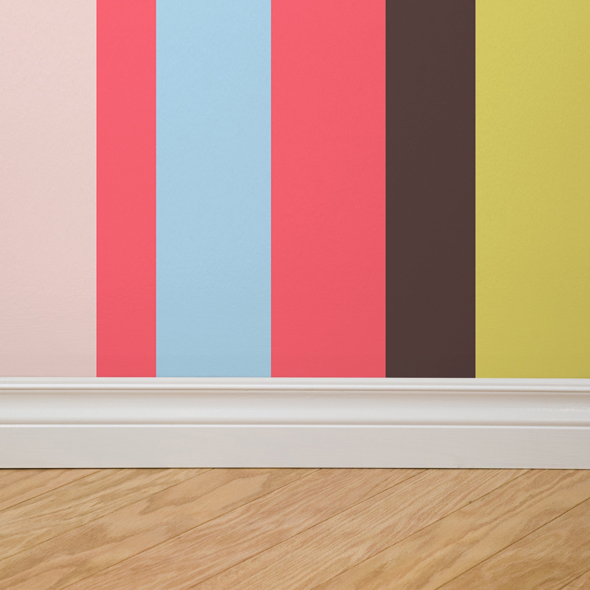 "Wall Blush So Fetch Wallpaper in a modern room with colorful striped pattern focused on wall decor."