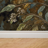 "Copper Garden Wallpaper detail by Wall Blush in a cozy corner of a living room, highlighting its botanical design."