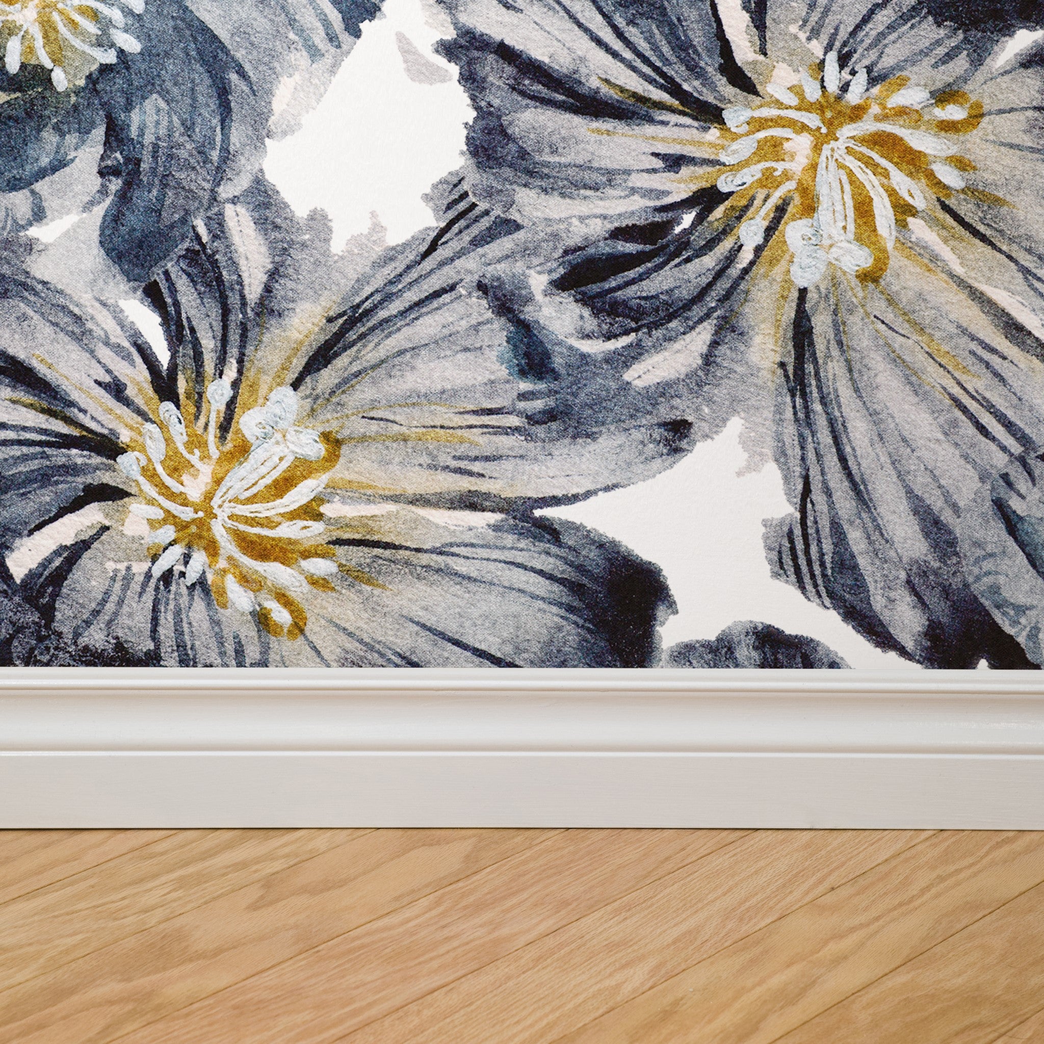 "Brie Wallpaper by Wall Blush featuring bold florals in a modern living room setting, accentuating wall decor."