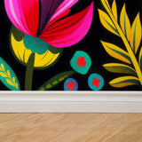 "Imelda Wallpaper by Wall Blush with vibrant floral design in a modern living room setting, highlighting the wall decor."