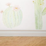 "Wall Blush 'Petals and Prickles (Small)' wallpaper featured in modern room, highlighting botanical design focus."