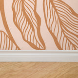 "Femme Wallpaper by Wall Blush in elegant living room, displaying stylish design focus."