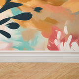 "Zinnia Wallpaper by Wall Blush installed in a living room, showcasing a vibrant floral design as the focus."