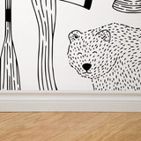 "Wall Blush's Trail Blazer Wallpaper featuring bear design in modern home interior, focus on stylish wall decor."