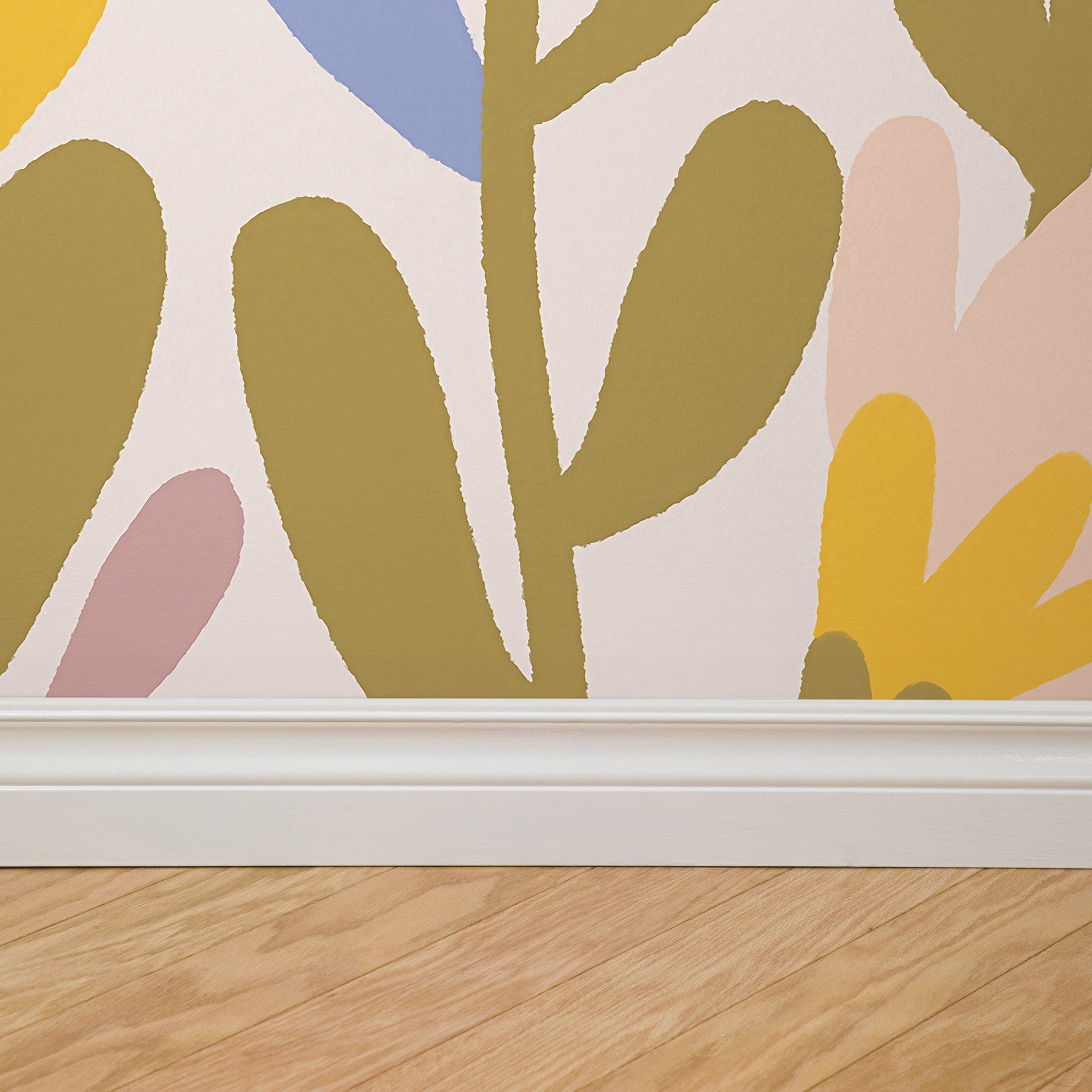 "Wall Blush Summer Florals Wallpaper featured in a modern living room, enhancing the space with vibrant patterns."