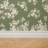 "Kingston Wallpaper by Wall Blush with floral design in modern living room, hardwood floor, serene ambiance."