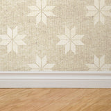 "Wall Blush Noel Wallpaper with distinctive pattern installed in a modern living room focusing on wall decor."