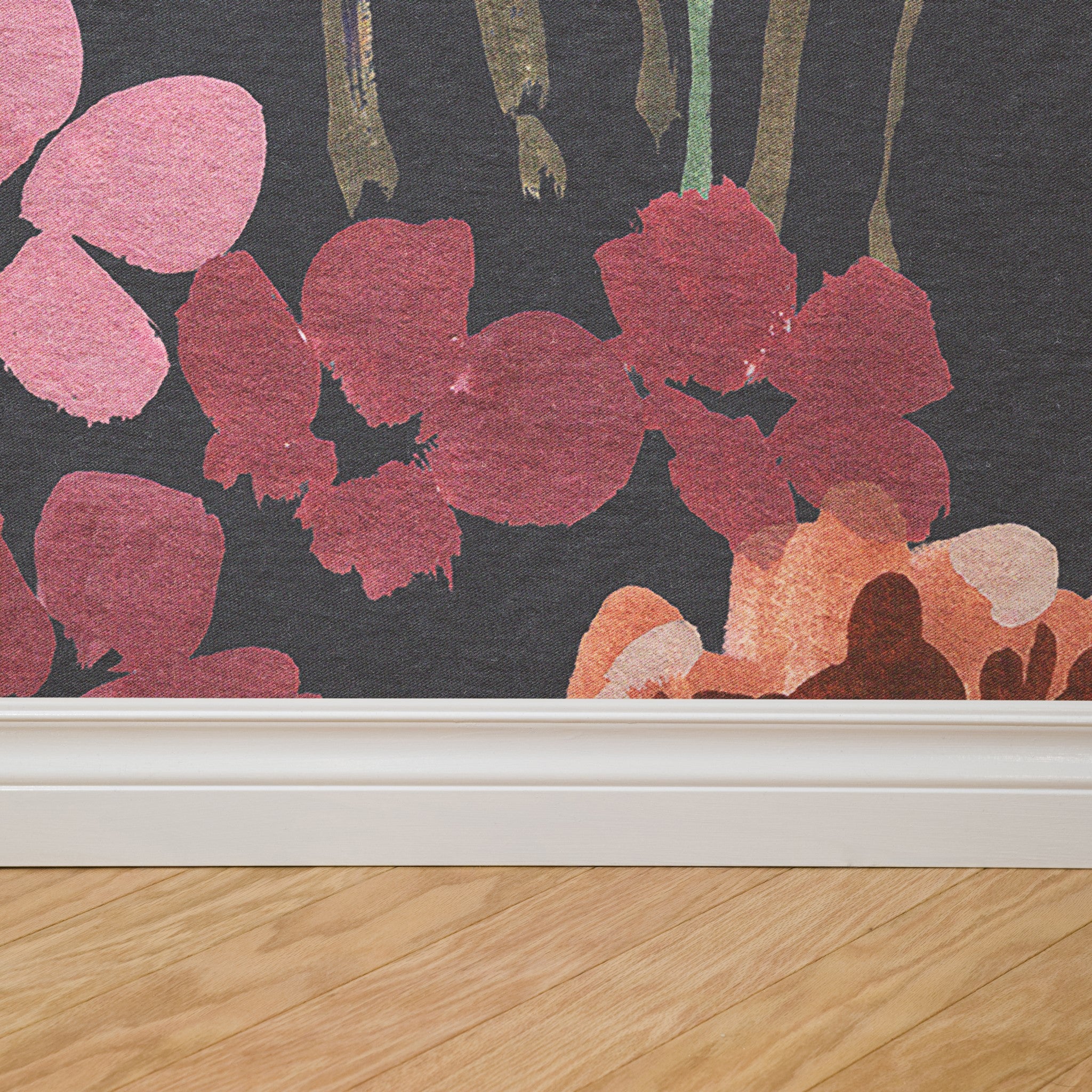 "Bloom Wild Wallpaper by Wall Blush in a modern living room, showcasing bold floral design as the focal point."