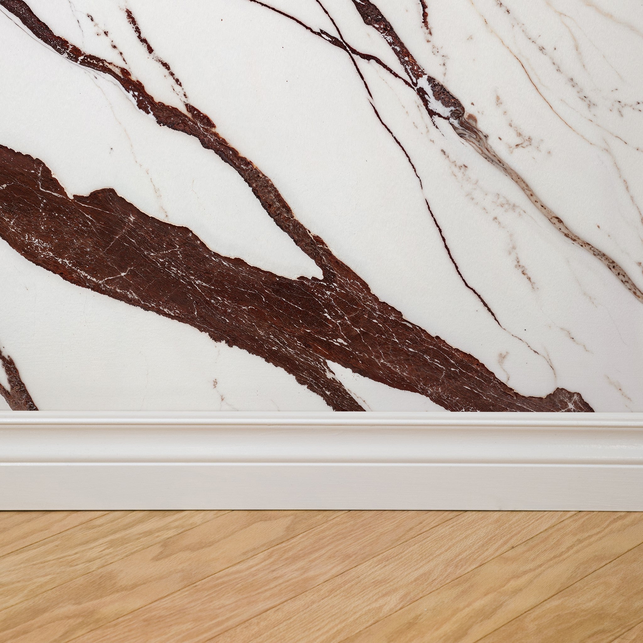 "Wall Blush Calacatta Wallpaper in modern living space, elegant marble design focus, beautiful room accent"