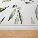 "Fiona Wallpaper by Wall Blush featuring botanical design in a living room setup with clear focus on the wall."
