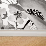 "Wall Blush's Midnight Flower Wallpaper featured in modern living room, showcasing floral design as focal decor."