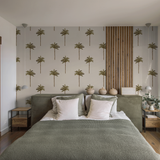 Bay of Palms wallpaper by Wall Blush AW01 in contemporary bedroom with tropical motif focus.
