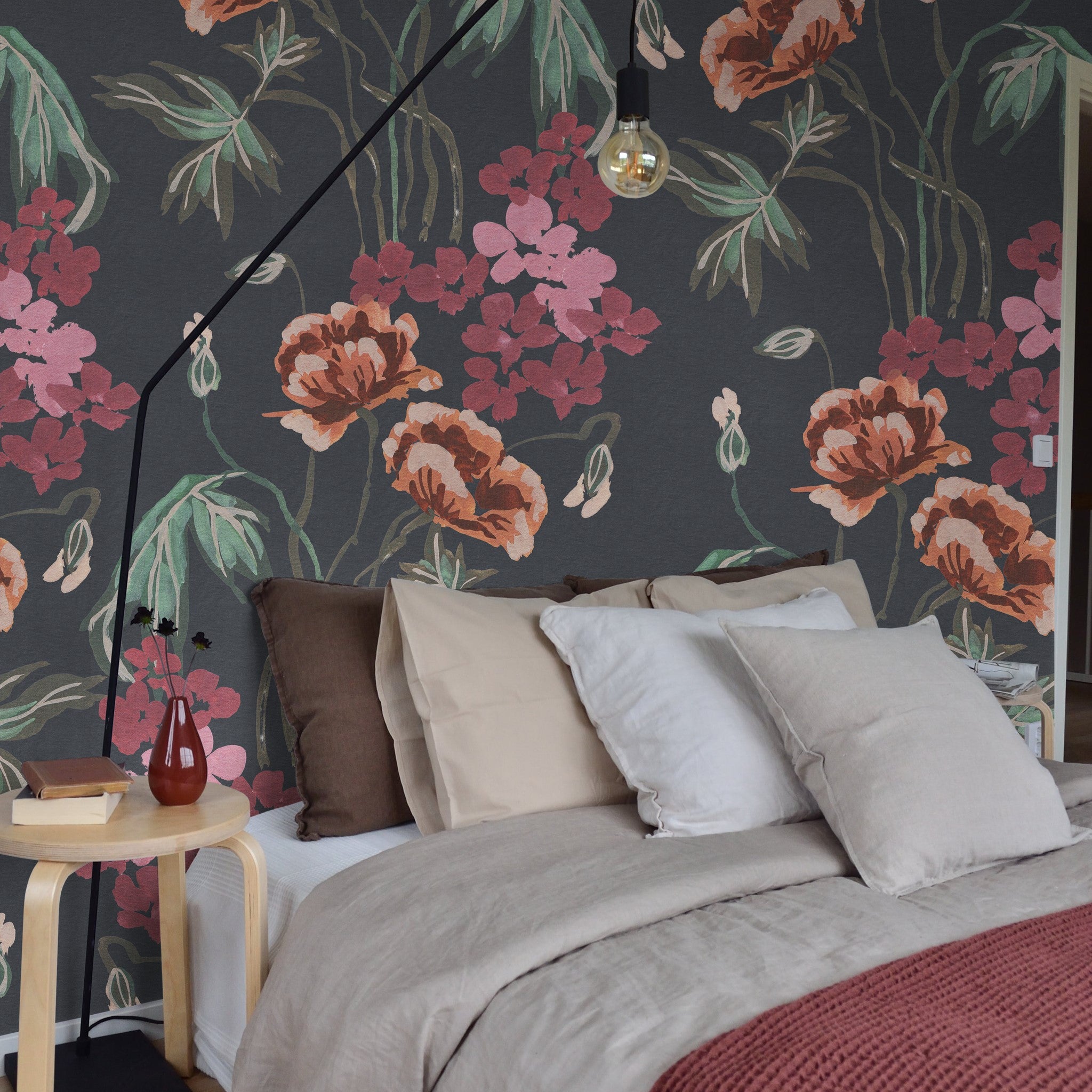 "Bloom Wild Wallpaper by Wall Blush in a cozy bedroom setting, showcasing floral patterns as the main decor."