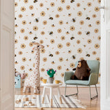 Alt: "Bumble (White) Wallpaper from Wall Blush enhancing a playful children's room, with focus on the patterned wall."