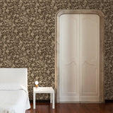 "Wall Blush's Burnett Wallpaper in elegant bedroom setting, showcasing the detailed floral pattern and texture."