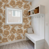 "Wall Blush's Buttercup Wallpaper in a cozy entryway, featuring bold floral patterns as the main focus."