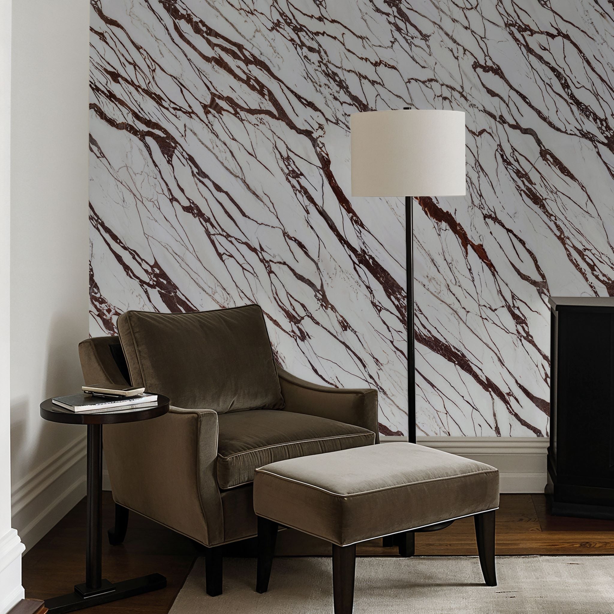 "Wall Blush Calacatta Wallpaper in elegant living room setting, showcasing luxurious marble design focus."