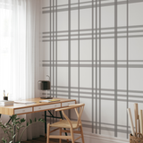 "Carolina Wallpaper by Wall Blush in a modern home office, showcasing elegant plaid design focus."