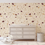 "Dahlia (Tan) Wallpaper by Wall Blush enhancing a nursery room's decor with elegant floral design."