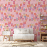 "Dream House Wallpaper by Wall Blush in a cozy children's room with a playful pink pattern."