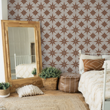 "Wall Blush Reality Star (Clay) Wallpaper accenting cozy bedroom decor with stylish patterns and warm tones"