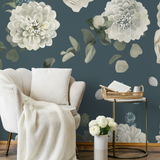 "Wall Blush's Forget Me Not Wallpaper in elegant living room setup emphasizing the floral pattern and cozy ambiance."