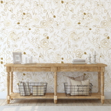 "Wall Blush's Golden Hour Wallpaper in a stylish living room decor highlighting the floral design focus."
