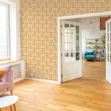 "Wall Blush's Good Day Sunshine Wallpaper in a bright modern living room with wooden floors and vibrant decor."