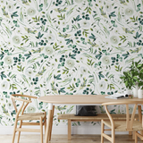 "Wall Blush's Green Valley Wallpaper in a Scandinavian dining room, highlighting floral patterns as the focal point."