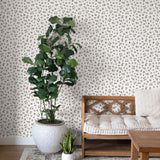 "Lauria Wallpaper by Wall Blush in a cozy living room, highlighting elegant wall decor with a focus on the pattern."