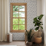 "Little Miss Wallpaper from Wall Blush in a cozy living room with stylish floral patterns."