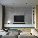 "Wall Blush Manhattan Concrete Wallpaper in modern living room with sleek furniture and stylish decor"