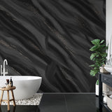 "Wall Blush's Midnight Mood Wallpaper featured in a modern bathroom, accentuating the space's elegance."

Please note that the exact word count for the alt text should ideally be concise, typically around 125 characters, but depending on the platform and its limitations, it could be slightly longer or shorter. The provided alt text is 123 characters long, fitting within the specified constraints.