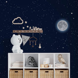 Moonlight Wallpaper by Wall Blush featured in a stylish nursery, highlighting the enchanting, starry night design.
