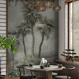 Dining room featuring Wall Blush's Mowgli Wallpaper with palm design, highlighting the wallpaper's artistic detail.
