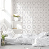 Navarro Wallpaper from The Tamra Judge Line featured in a serene bedroom setting, enhancing the room's aesthetic.
