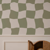 Nelly Wallpaper by Wall Blush SG02 in a child's room with playful green and beige pattern focus
