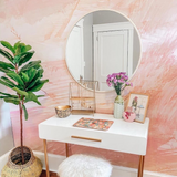 "The Nora Mural Wallpaper by Wall Blush featured in stylish modern vanity room setup"