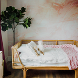 "The Nora Mural Wallpaper by Wall Blush featured in a cozy bedroom setup with modern decor."
